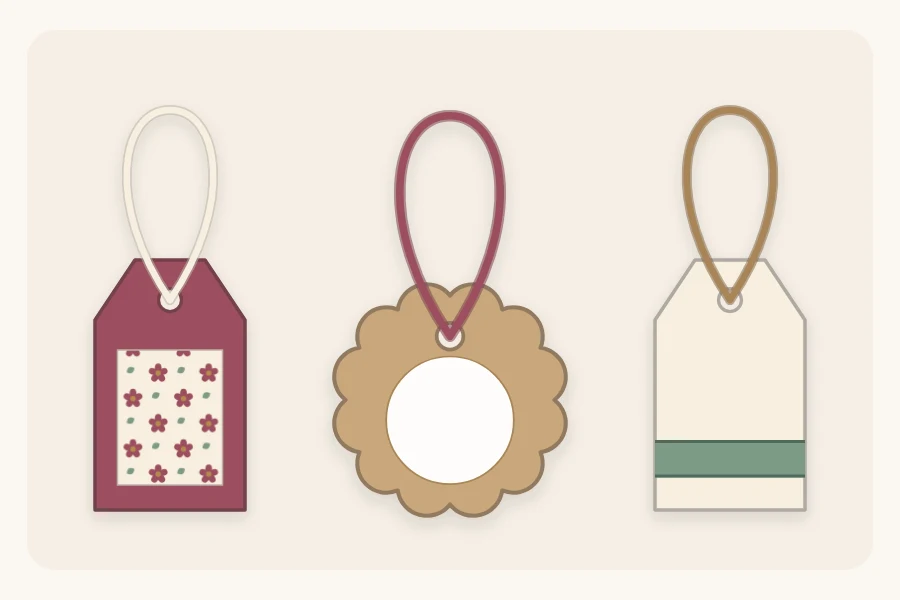 Three layered gift tags: a patterned panel, a circle on a scalloped circle and a ribbon strip
