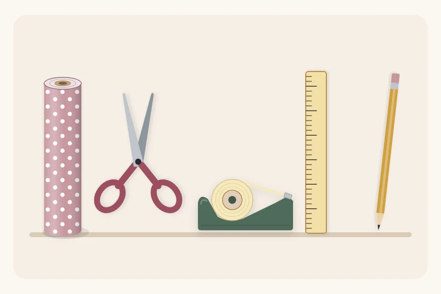 A roll of paper, scissors, tape dispenser, ruler and pencil laid out in a row