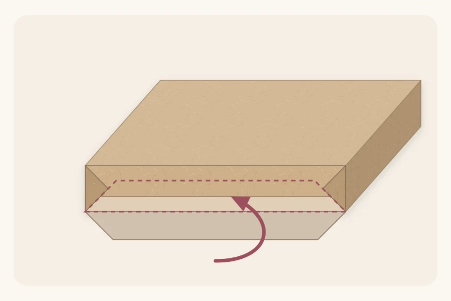 Short end of a wrapped book with thin triangular flaps and the last flap folding up