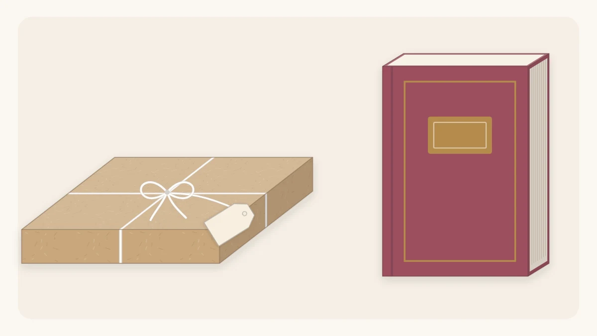 Book wrapped in kraft paper with twine and a small tag beside an unwrapped hardcover