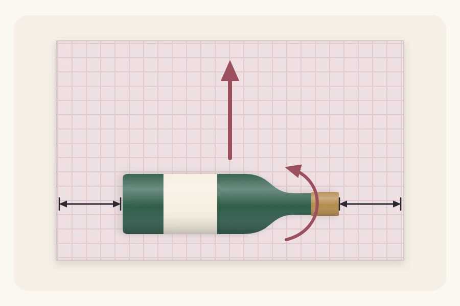 A bottle lying on a paper sheet with an arrow showing the rolling direction