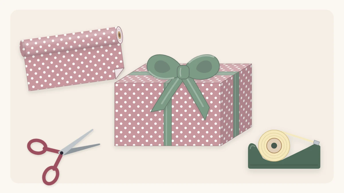 Wrapped gift box in dotted rose paper with a sage bow beside paper, scissors and tape