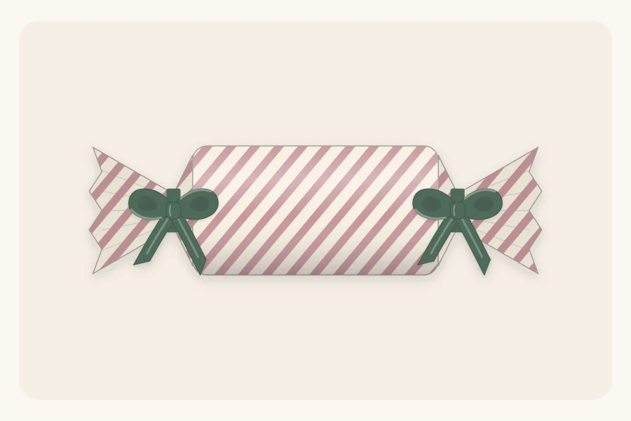 A cylinder rolled in paper with both ends gathered and tied with ribbon