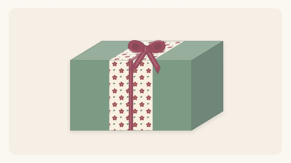 A gift in solid sage paper with a wide patterned band around the middle and a narrow ribbon
