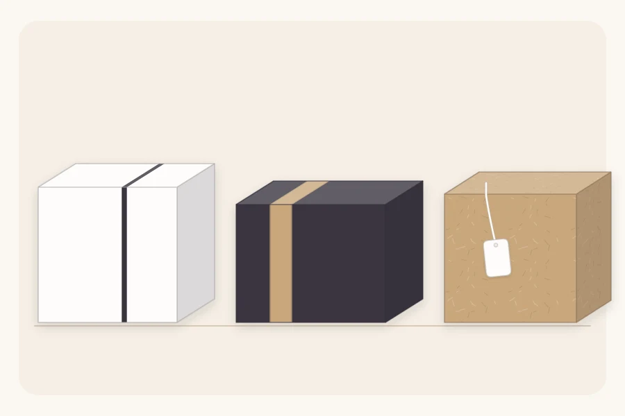Three plain wrapped gifts finished with a thin ribbon, a paper band and a small tag