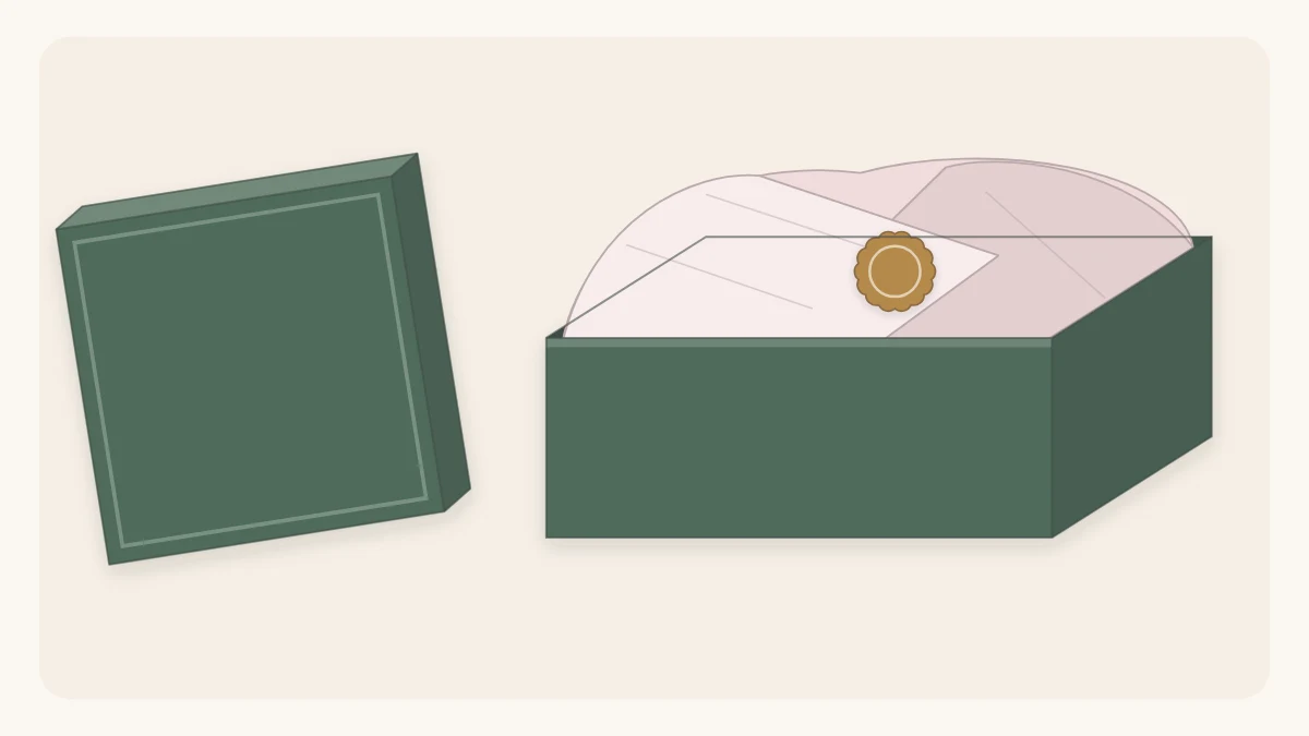 An open gift box lined with blush tissue paper folded over a gift and closed with a round paper seal
