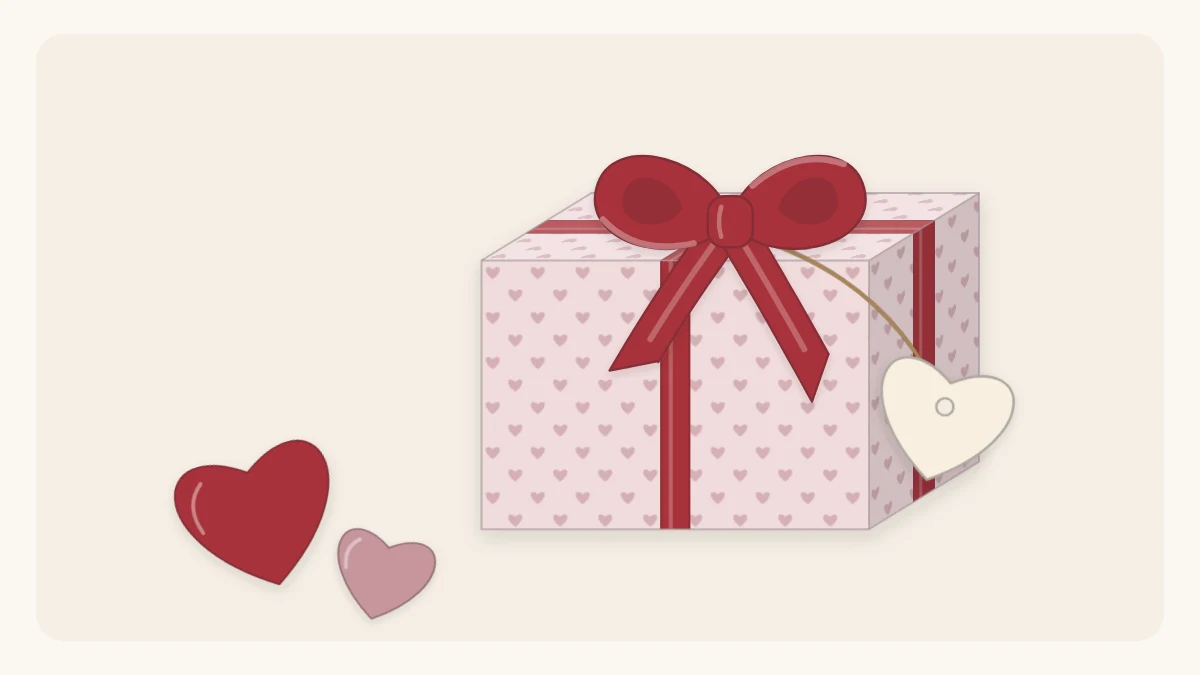 A small gift box in blush paper with a deep red ribbon and a heart-shaped tag, two paper hearts beside it